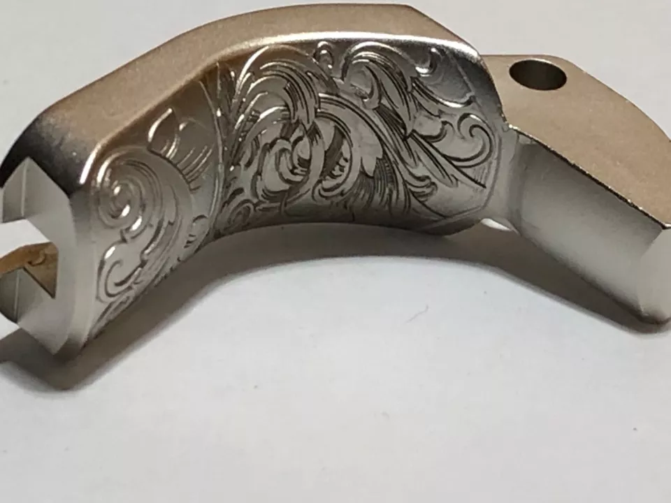 1911 GI style grip safety deep laser engraved scroll pattern
