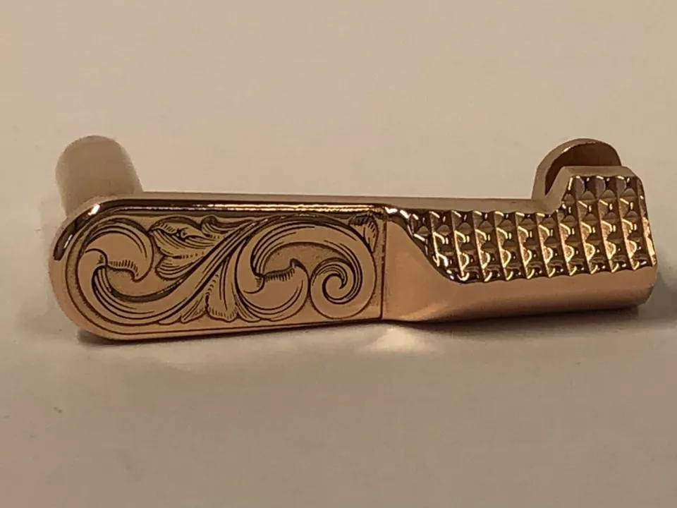1911 slide stop 45 ACP deep engraved