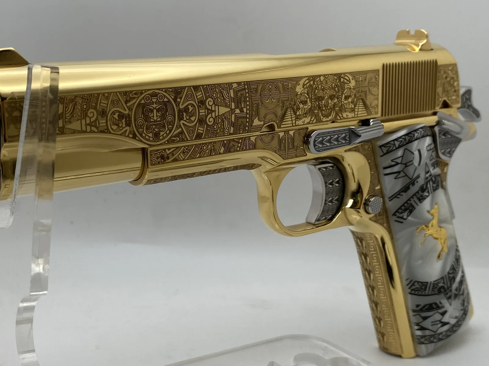 1911 with Aztec calendar and skull engraving and pearl grips