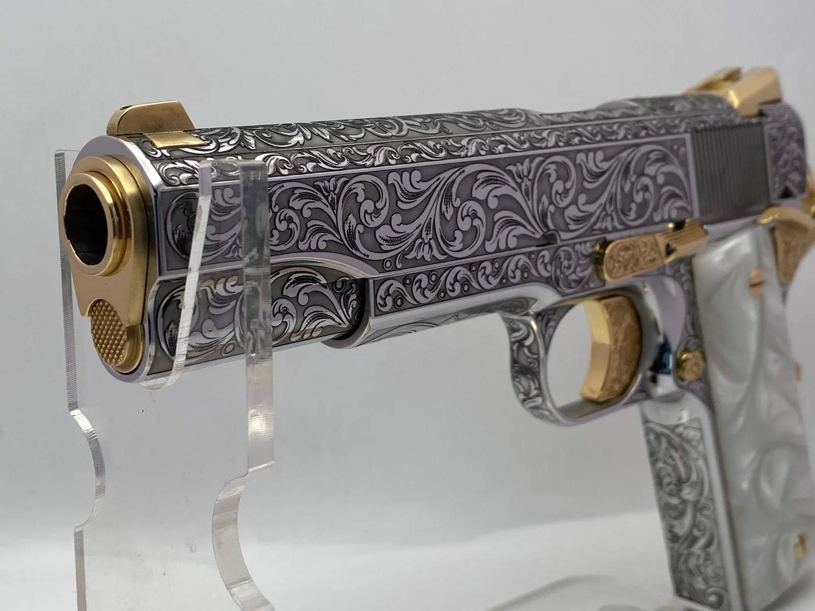 1911 with deep scroll engraving and gold accents