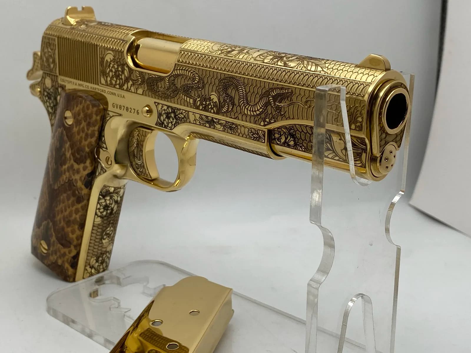 1911 with rattlesnake engraving and snakeskin grips