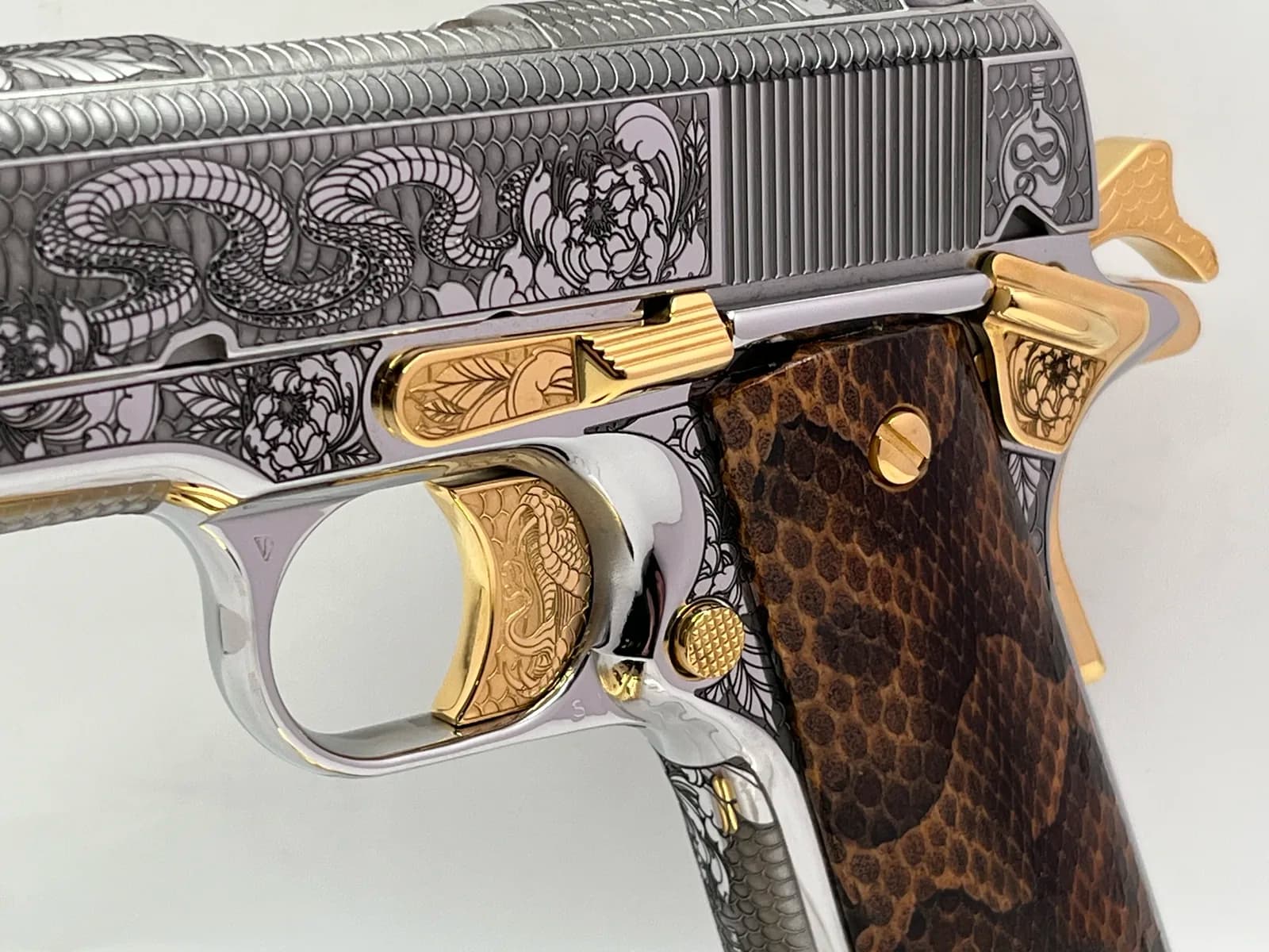 1911 with rattlesnake engraving, snake trigger and snakeskin grips