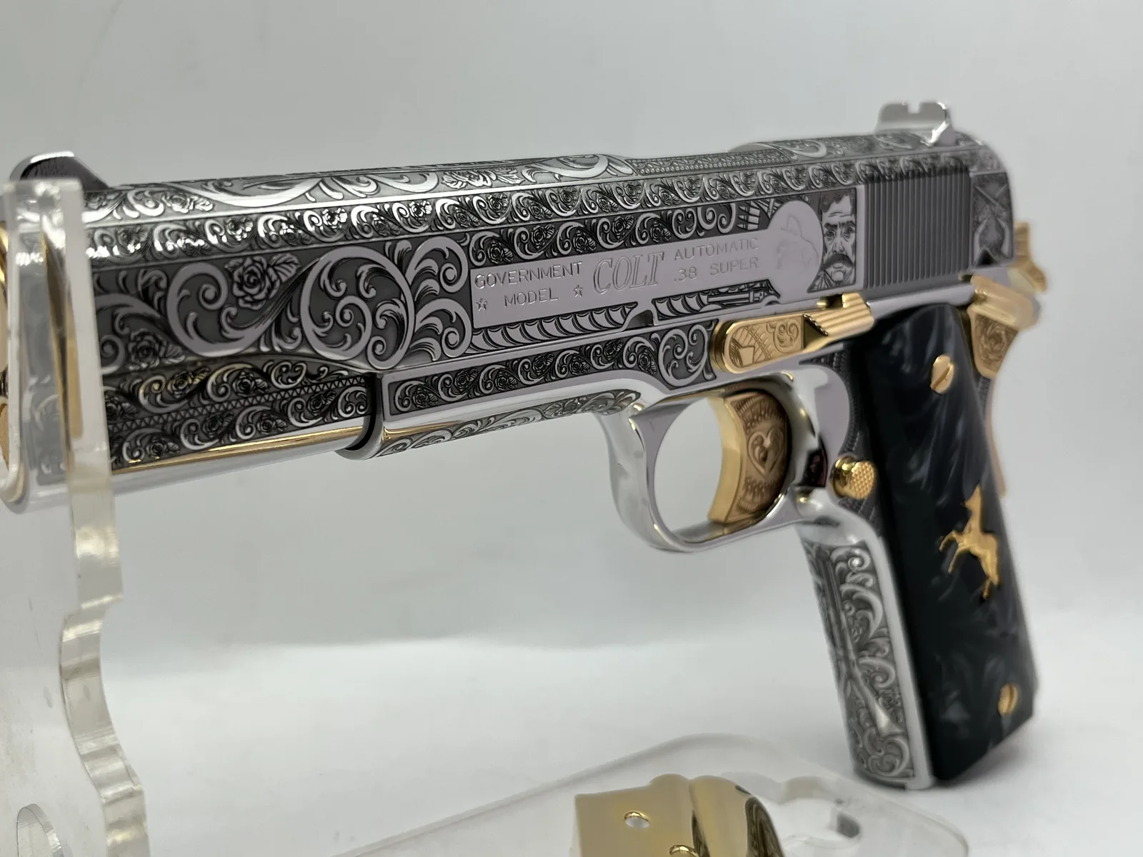 1911 with scroll, rose and portrait engraving