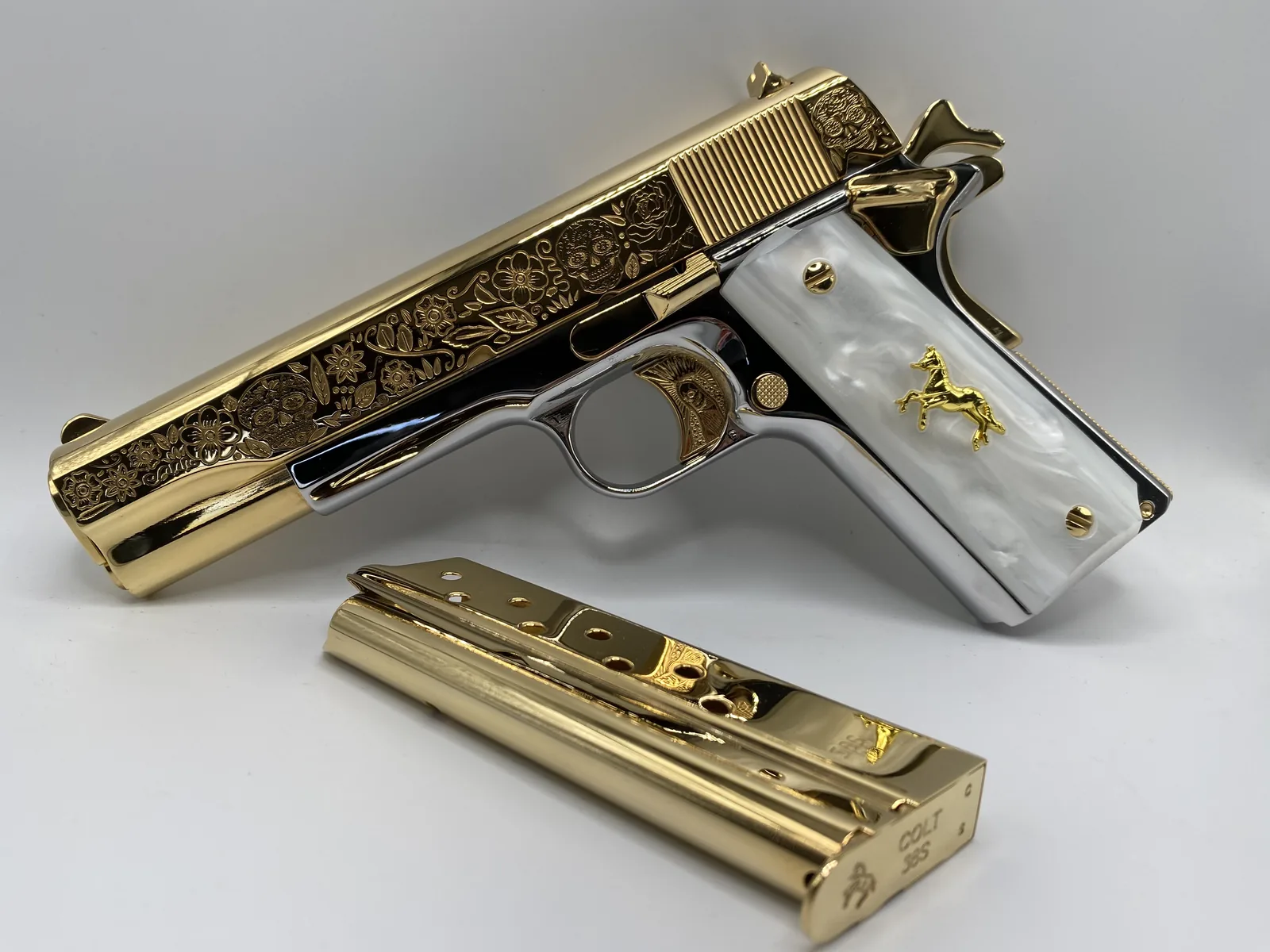 1911 with sugar skull engraving and pearl grips
