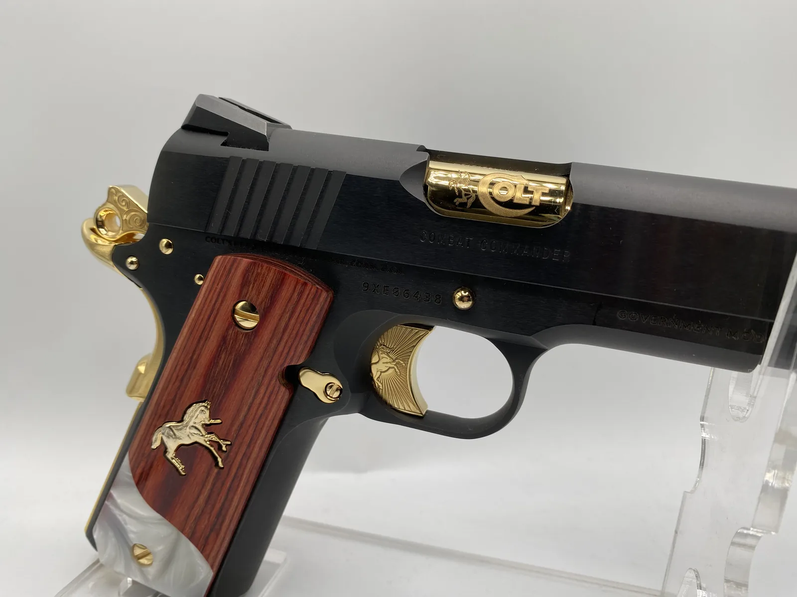 Colt Combat Commander with gold accents and rosewood grips
