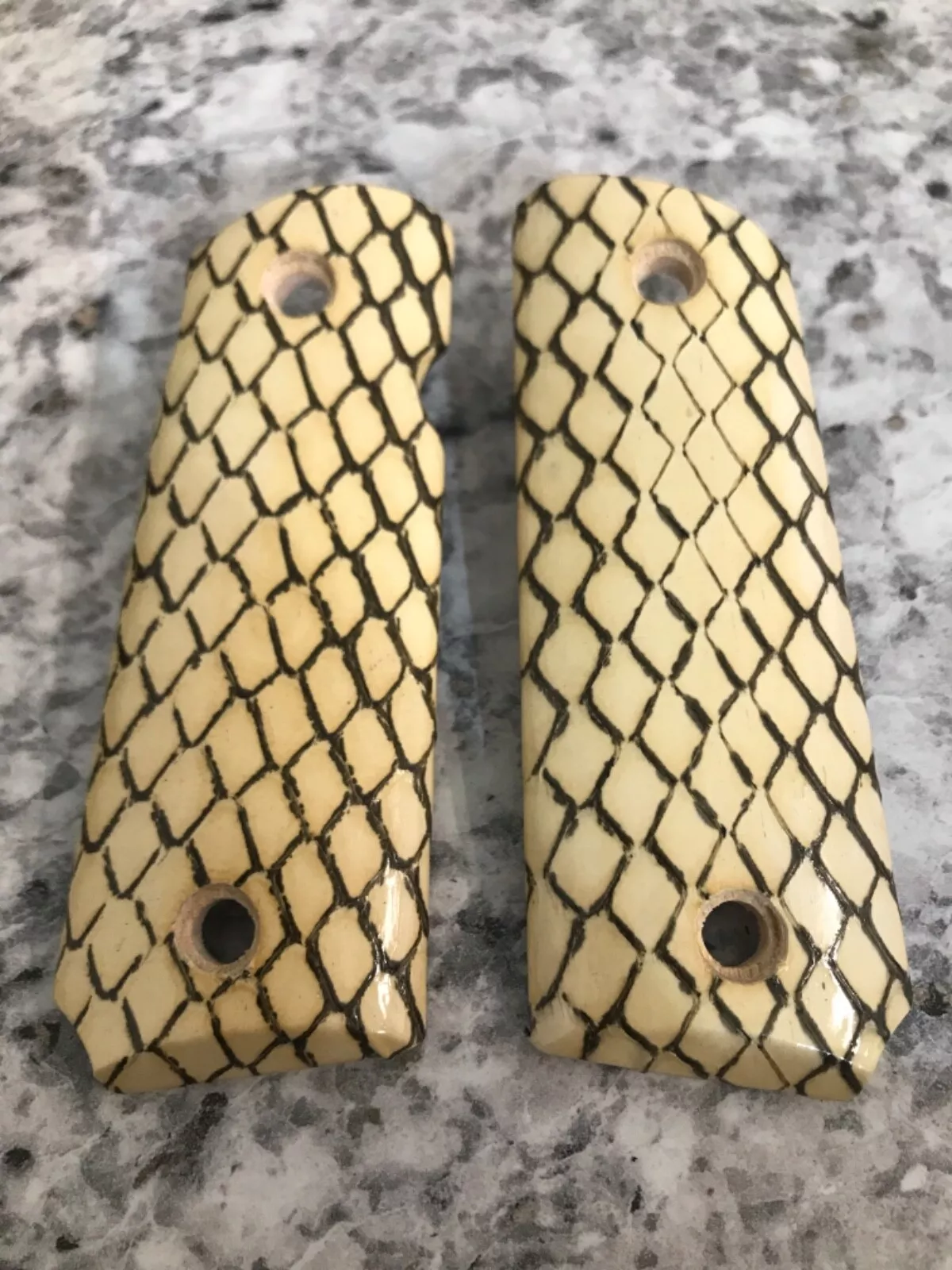Compact 1911 ambi-cut pistol grips wrapped in cobra snakeskin