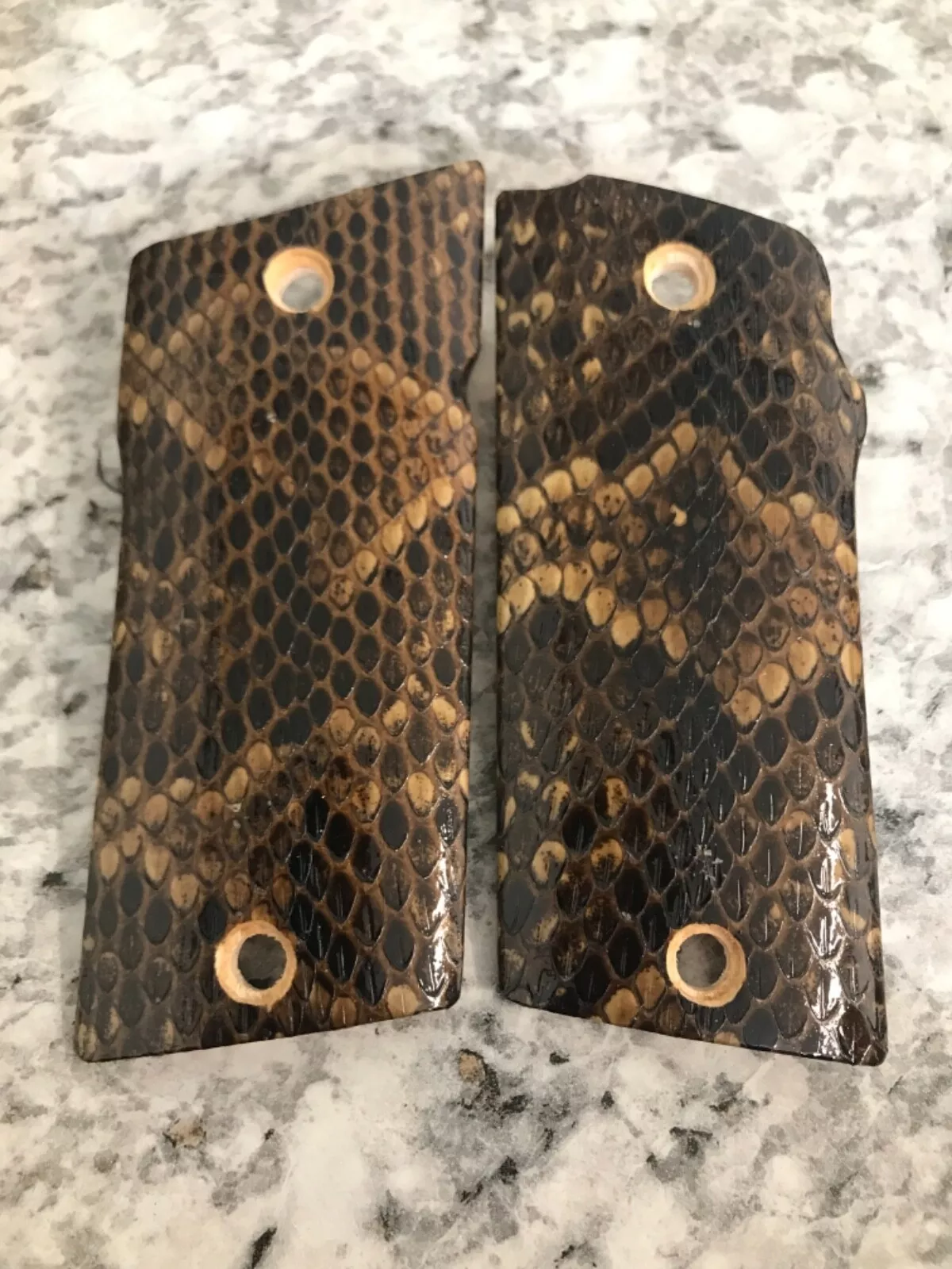 Coonan compact 357 pistol grip wrapped in cottonmouth snakeskin