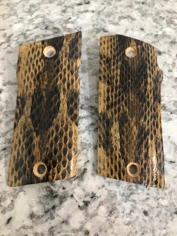 Coonan compact 357 pistol grip wrapped in timber rattlesnake snakeskin
