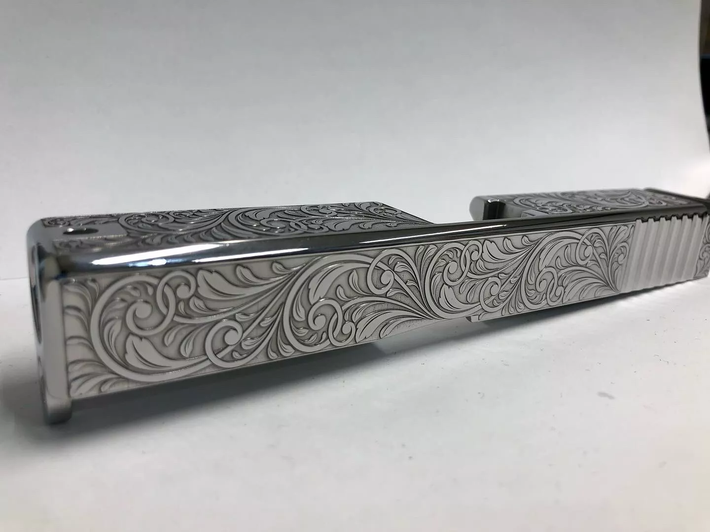 Deep laser engraved Glock 19 slide Gen 3 scrolls