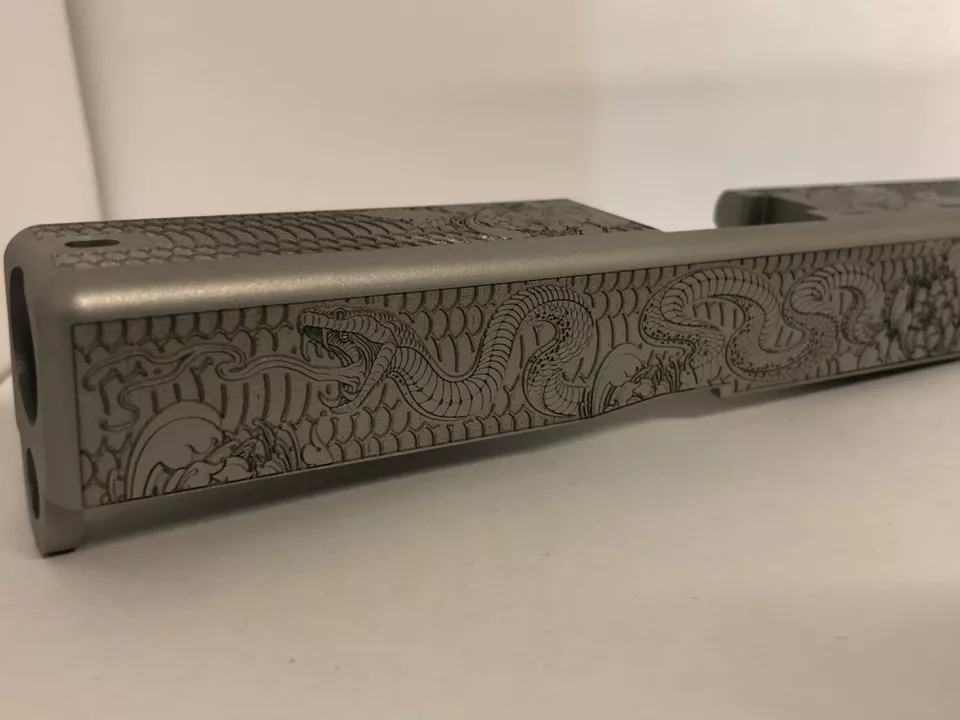 Deep laser engraved Glock 19 slide Gen 3 snake themed