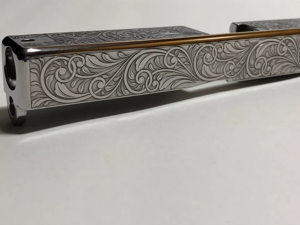 Deep laser engraved Glock 17 slide Gen 3 scrolls