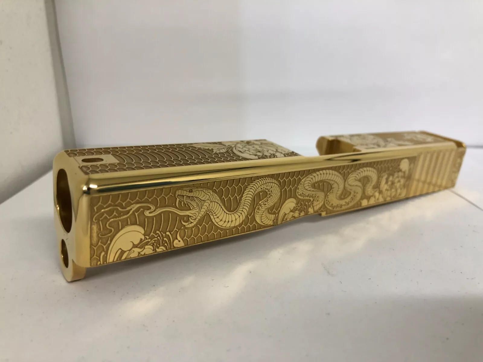 Deep laser engraved mirror polished Glock 19 slide Gen 3 snake themed