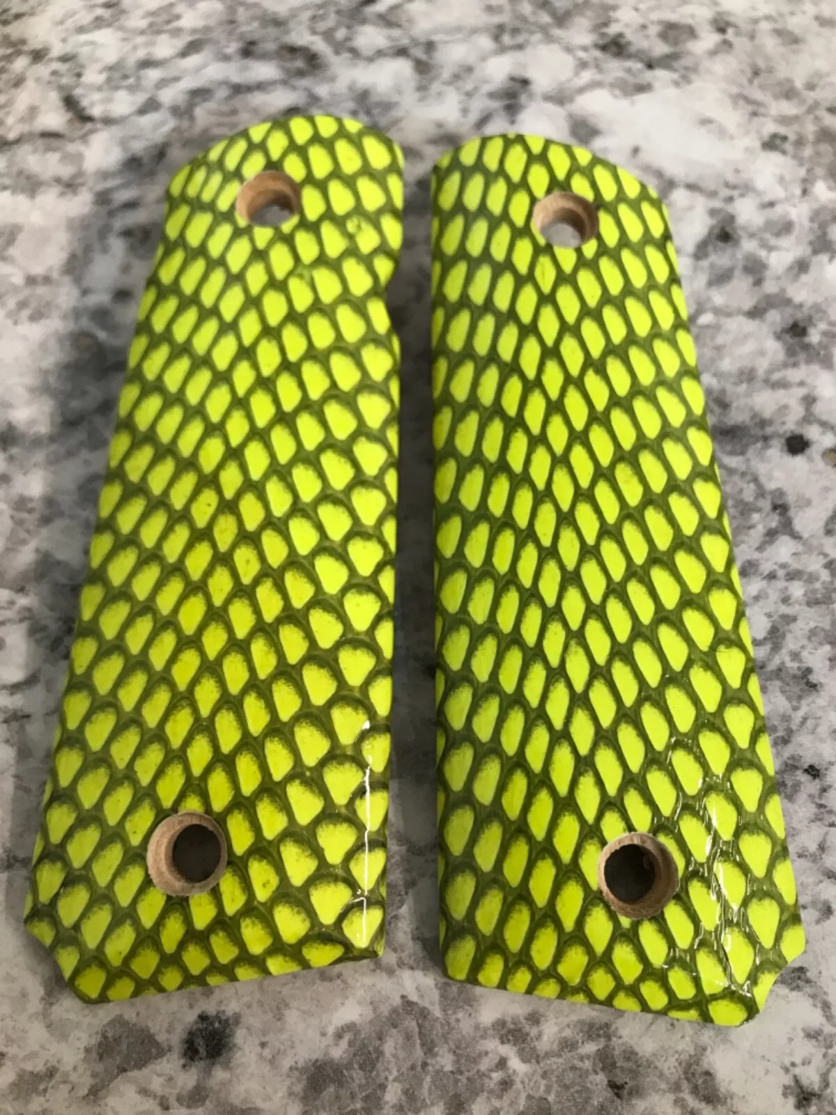 Full-size 1911 ambi-cut pistol grips wrapped in cobra snakeskin