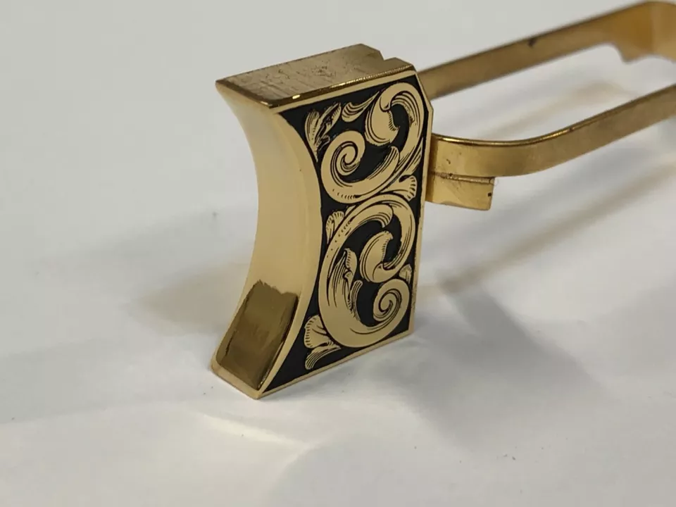 Laser engraved 1911 mirror polished long pad scroll design