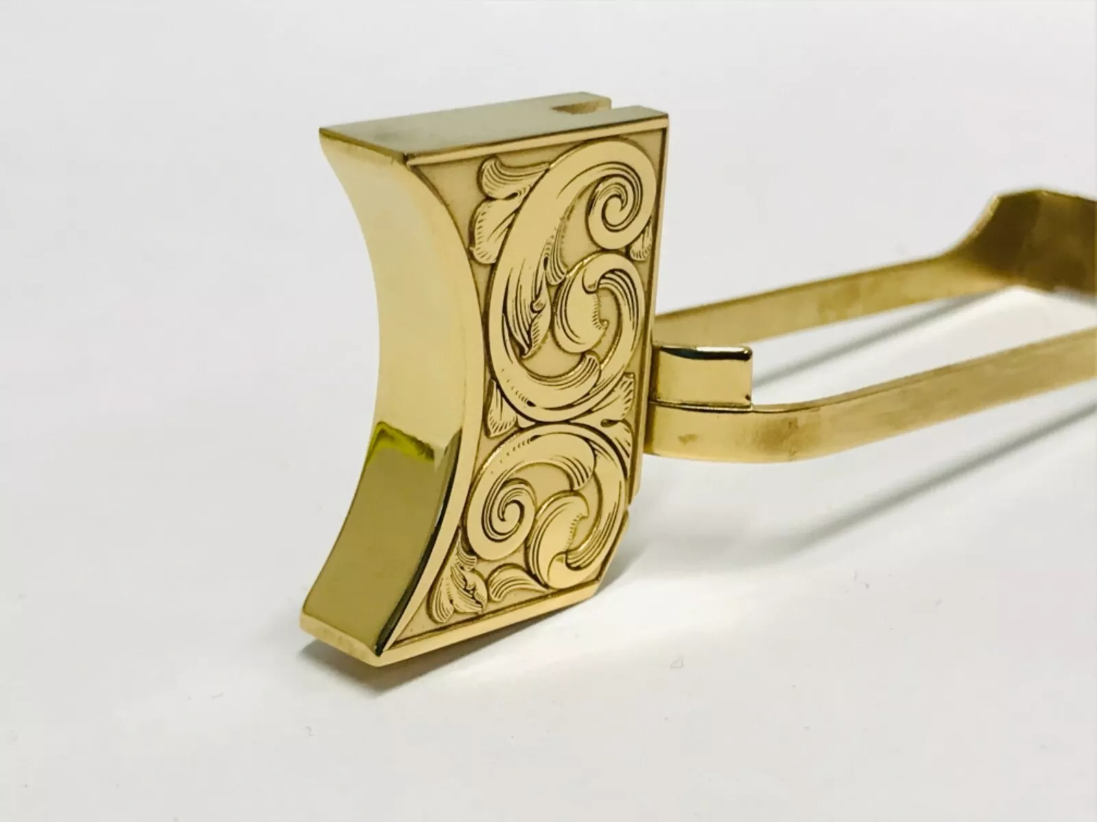 Laser engraved 1911 mirror polished long pad scroll design
