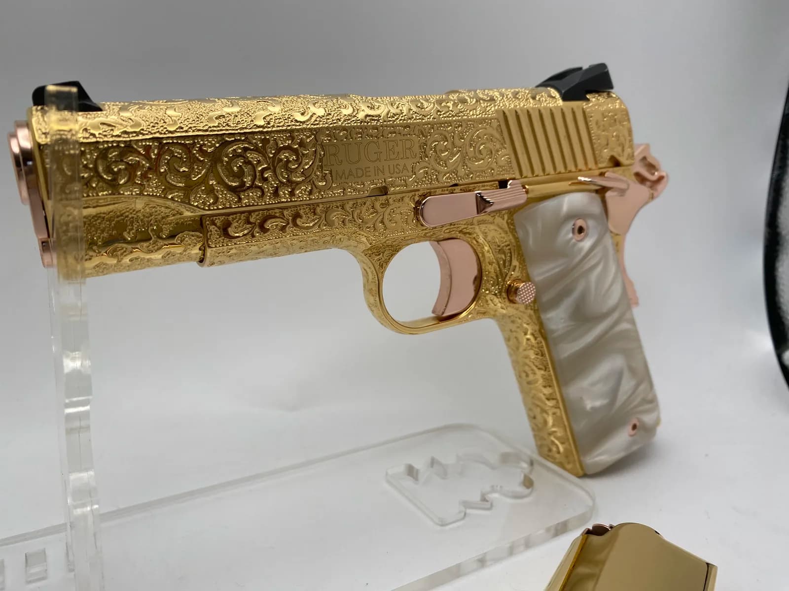 Ruger 1911 with deep relief scroll engraving