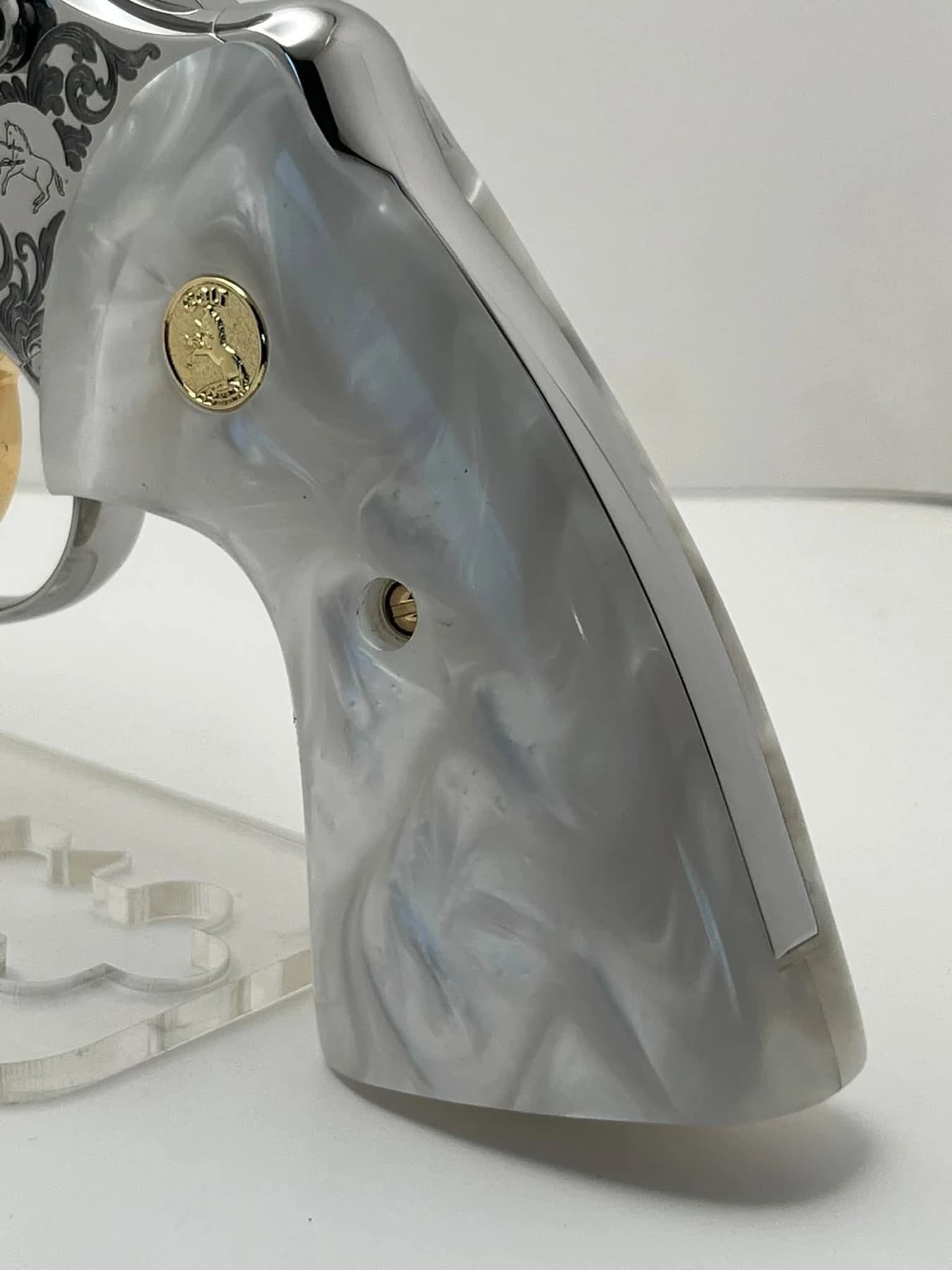 Colt Python Elite with scroll engraving: white pearlescent grip