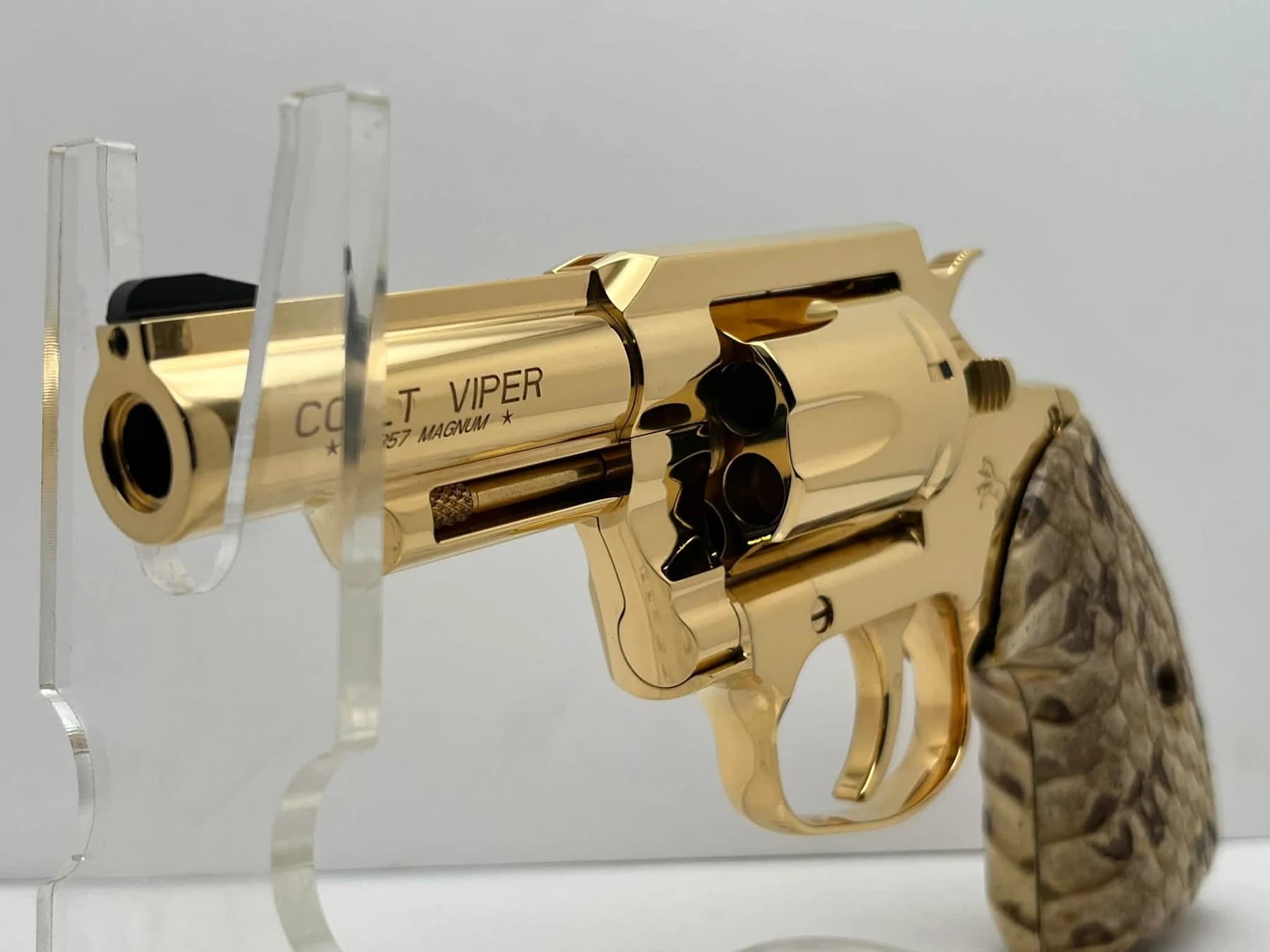 24k gold-plated Colt Viper with snakeskin grips: front quarter view