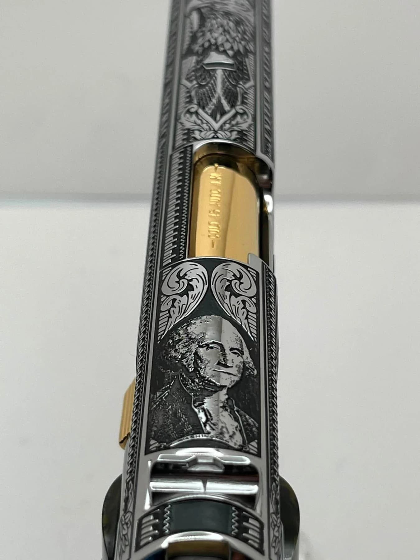 One-of-one Colt .45 with detailed engraving: top engraving