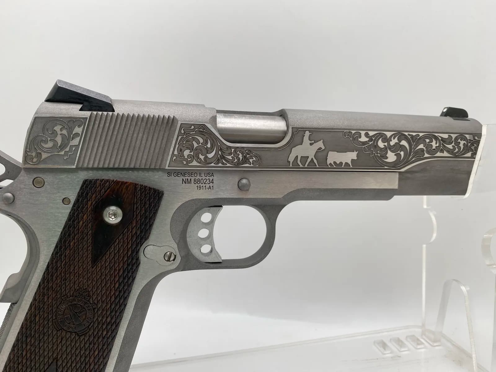 Springfield Armory 1911 with cowboy scene engraving